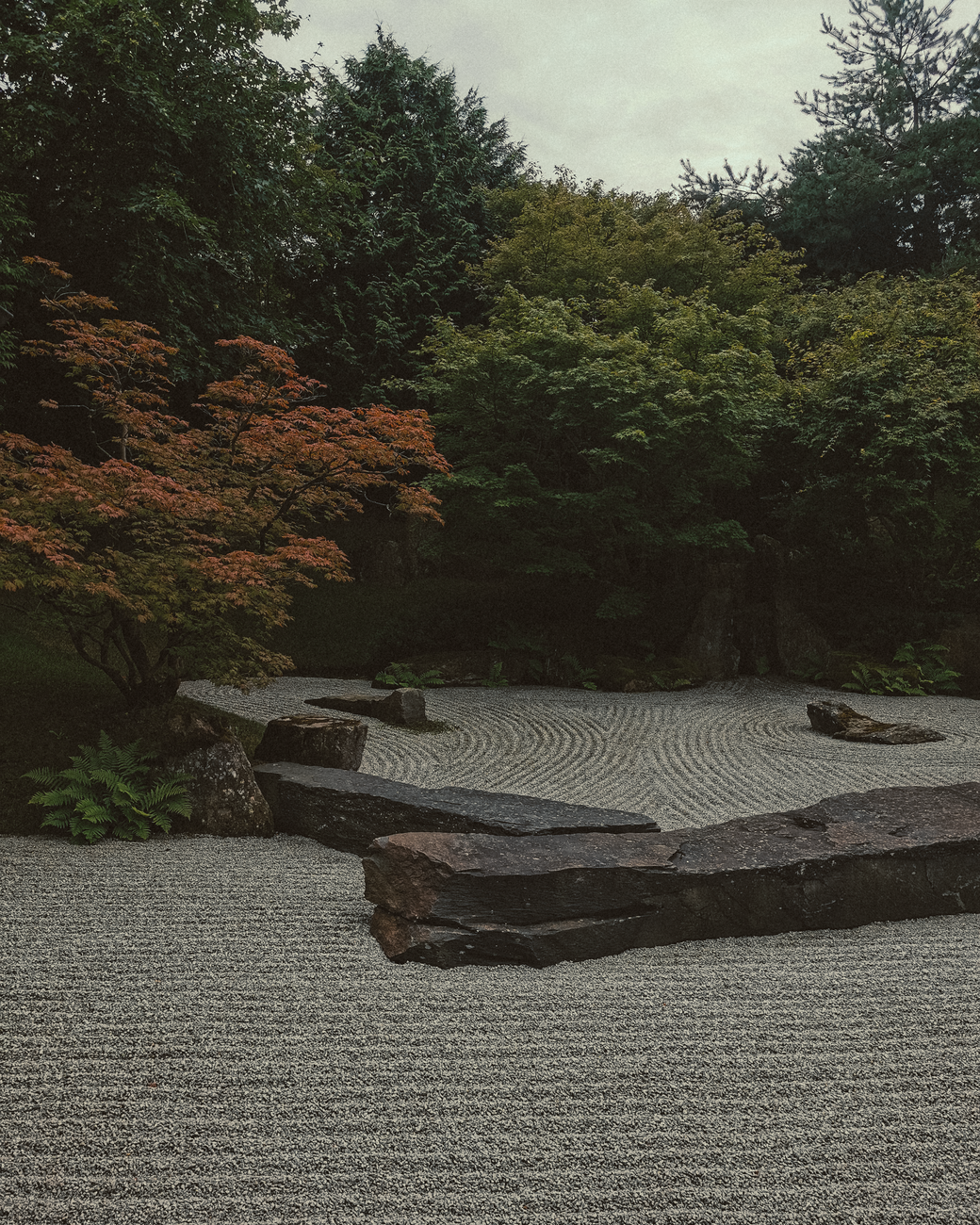 Zen stone rock garden with raked gravel